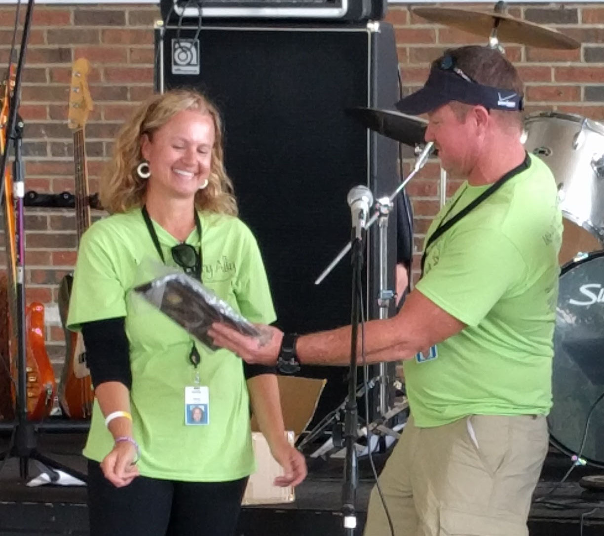 Stacy Sorrells of Vaya Health receiving an award for being named the 2017 Recovery Champion of the Year for the 3rd annual Western Regional Recovery Rally.