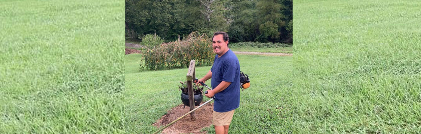 Jeremy from Jeremy's Lawn and Garden working on a yard.