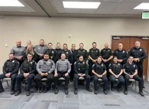Photo of officers sitting together after completing their CIT training.