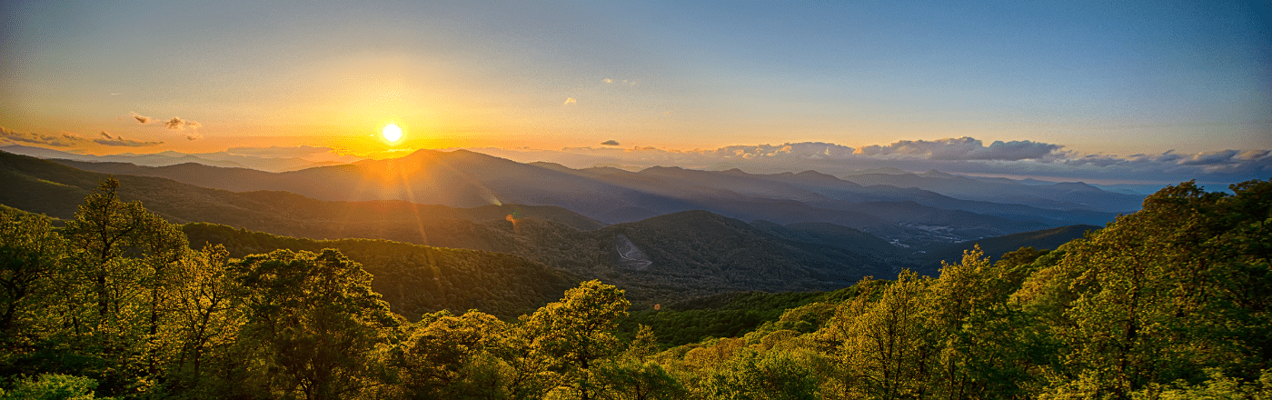 View of mountain peaks at sunset