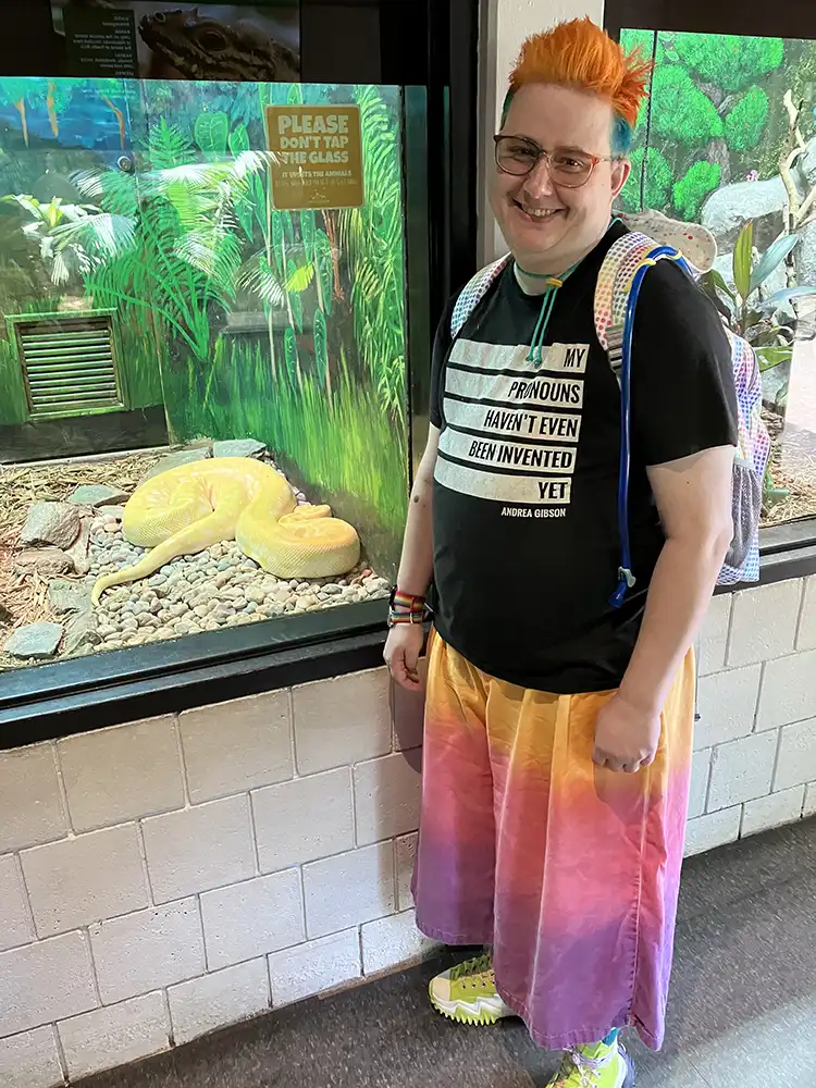 Jade McWilliams visiting the snakes at the Asheville Zoo