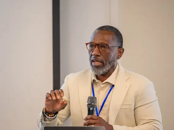 Victor Armstrong presenting at a convention.
