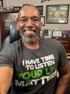 Victor Armstrong sitting in his office.
